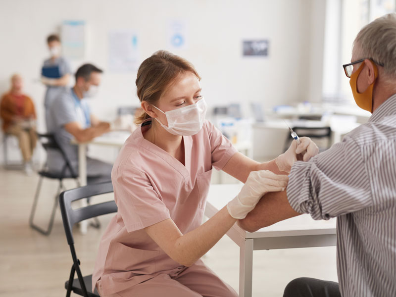 nurse helping a patient